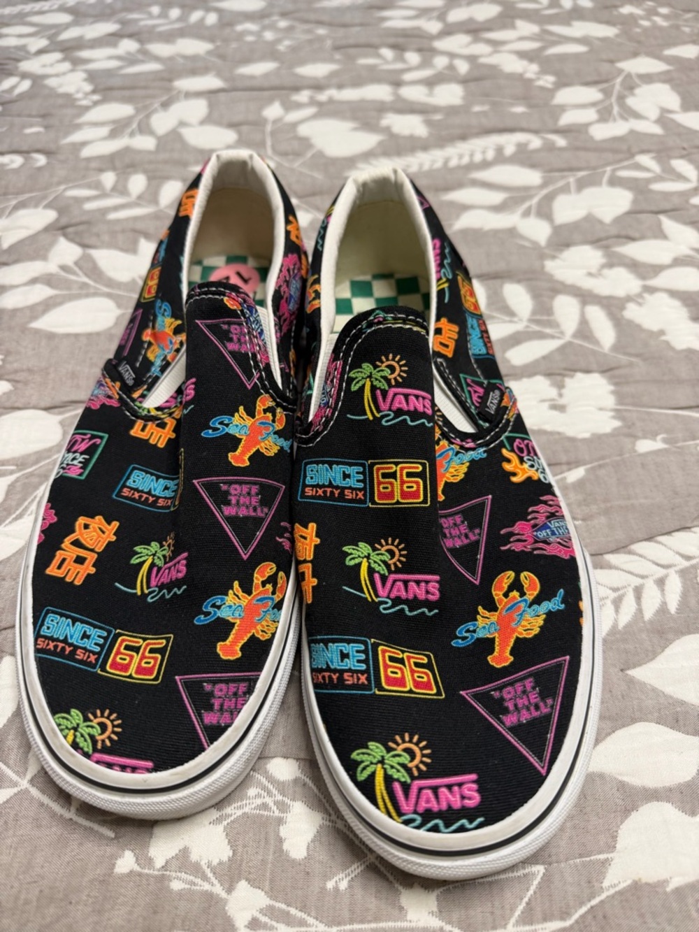 Vans Black Slip-On Sneakers with Neon Multi Graphics